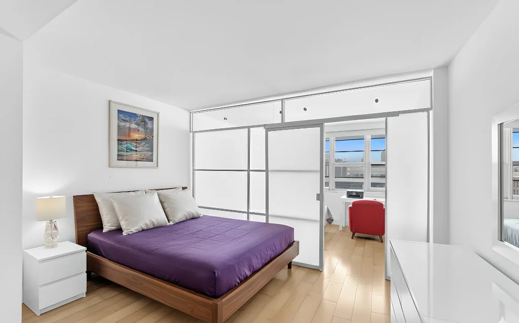 Bedroom created with 1W2R freestanding sliding wall system in NYC co-op — fully landlord-approved, no permits